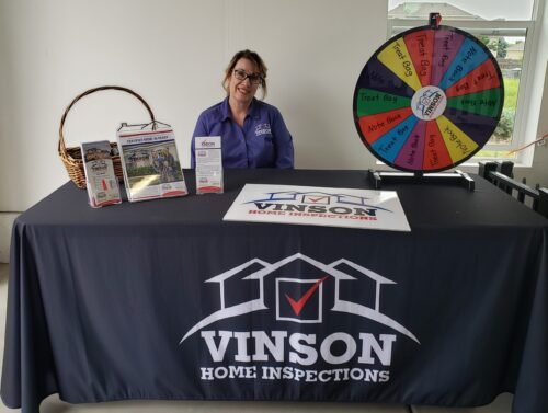 Vinson-Home-Inspections-display-table-at-a-realtor-event-scale