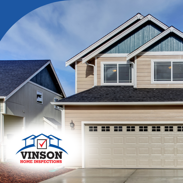 Contemporary two-story home with a clean driveway and light beige siding