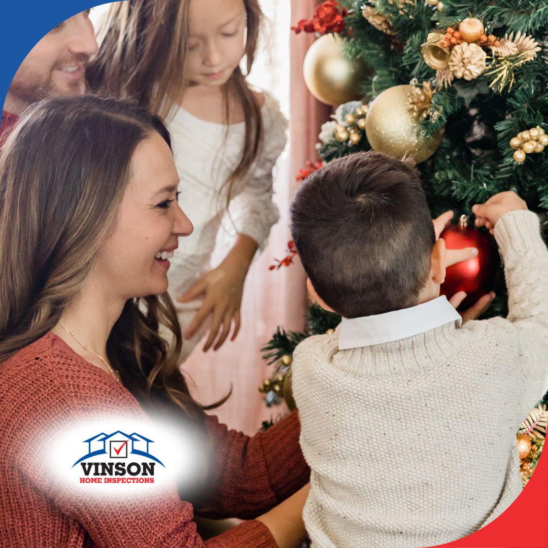A joyful family decorating their Christmas tree together