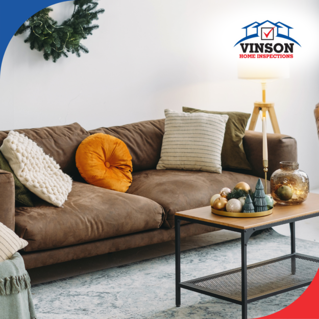 A cozy arrangement, with a teapot and decorative candle holder on a book.