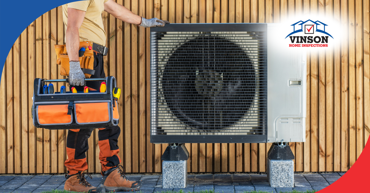 Vinson Home Inspections HVAC technician standing next to an outdoor unit with a tool bag in hand.