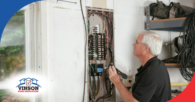Home inspector performing an electrical panel inspection at a property